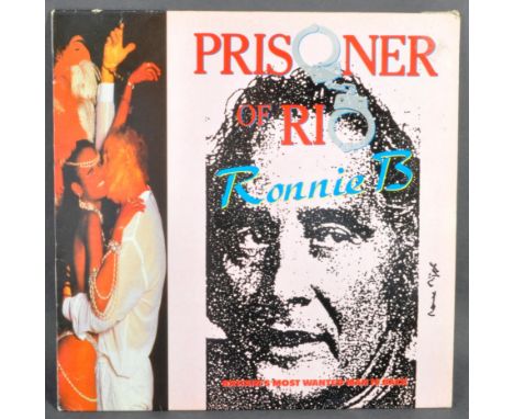 The Great Train Robbery - Prisoner Of Rio (Movie Tie-In LP) - signed vinyl record LP by Ronnie Biggs (1929-2013). Signed in b