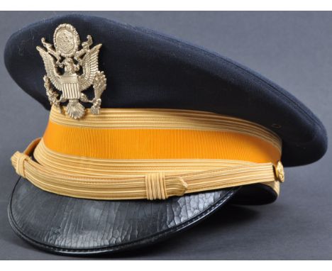 A 20th century United States Army / US Army Cavalry Officer's peaked visor uniform cap. Made by Bancroft Military Caps, compl