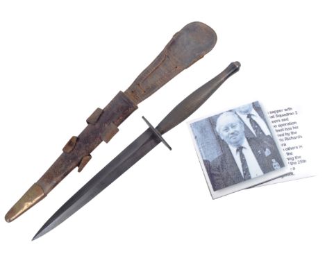 An original WWII Second World War 2nd Pattern Fairbairn Sykes made commando fighting dagger. Usual form, with chequered grip,