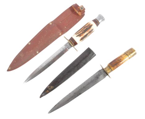Two WWII Second World War period British Army commando type fighting knives. One having an alloy pommel, stag horn grip and b