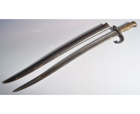 A 19th Century French 1866 pattern ' Chassepot ' rifle bayonet. The bayonet having ribbed brass hilt, muzzle ring and forward