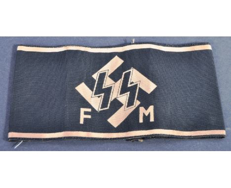 A WWII Second World War Third Reich Nazi German SS FM ( Patron Members ) cloth armband. Black linen construction with white S