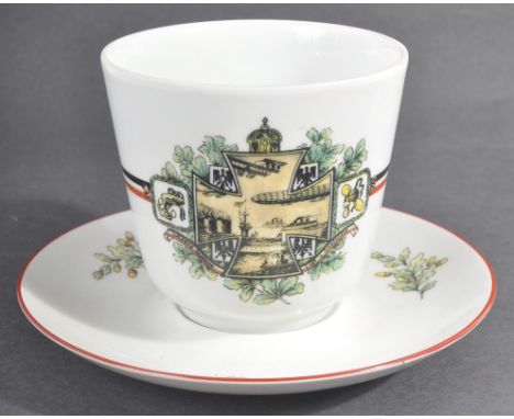 WWI First World War Interest - a 20th century Vohenstrauss of Germany made ceramic cup and saucer, the cup depicting an Iron 