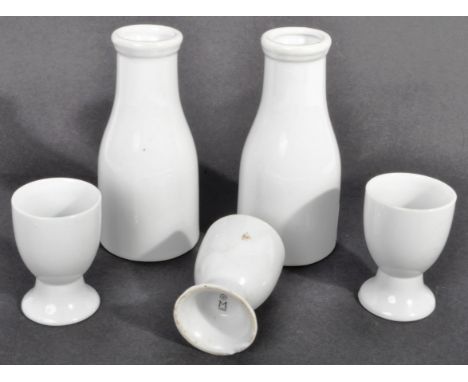 A collection of original WWII Second World War Third Reich Nazi German ceramic kitchen / mess items comprising x3 egg cups an