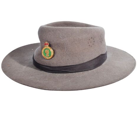 An original WWII Second World War Women's Land Army wide-brimmed uniform hat.&nbsp;Wide-brimmed hat Khaki fur felt with a cen