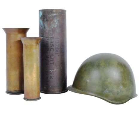 An original post WWII Second World War 1949 dated Czech M32 helmet and x3 assorted later period Artillery / field gun ammunit