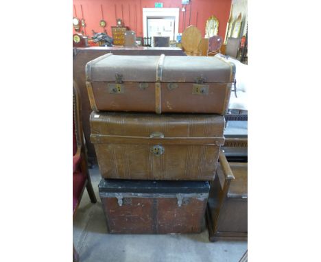 Two steamer trunks and a tin trunk