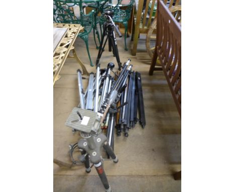 Sixteen camera tripods
