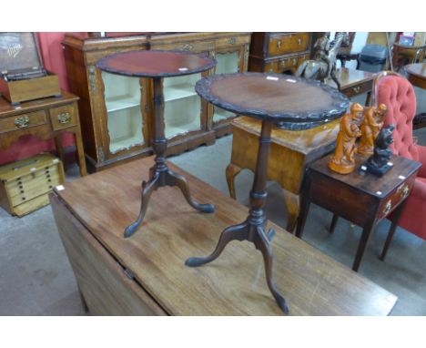 A pair of Edward VII mahogany tripod wine tables