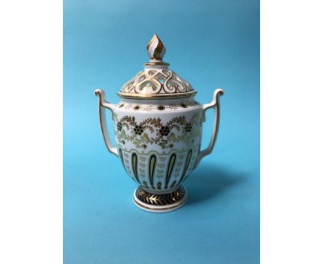 A Royal Worcester Heritage collection 2010 vase and cover, 19cm high