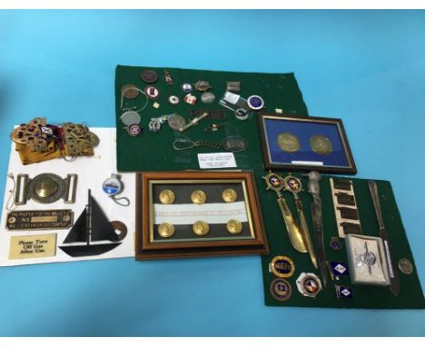 A quantity of enamel badges and buttons etc.