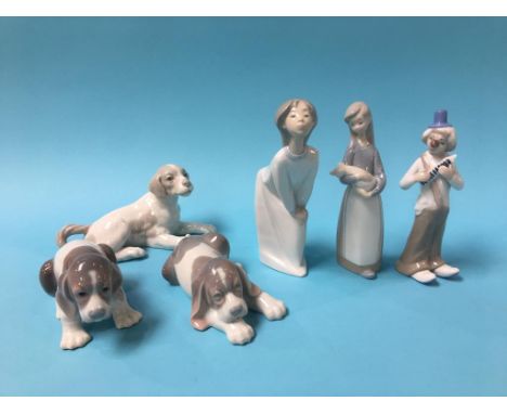 Two Lladro figures, two Lladro dogs, a Nao dog and one other figure (6)