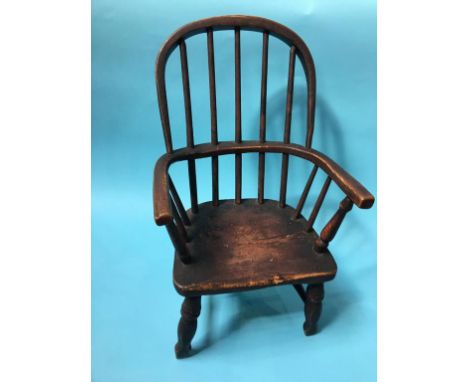A child's stick back Windsor chair