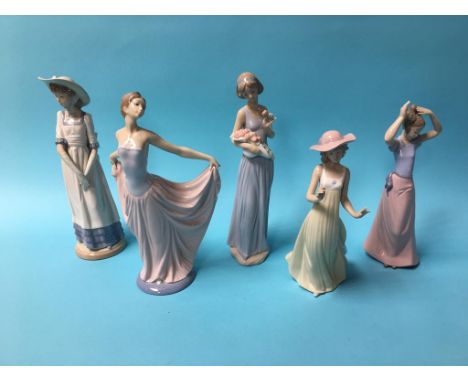 A Lladro figure of a lady holding her dress aloft and four Nao figures (5)