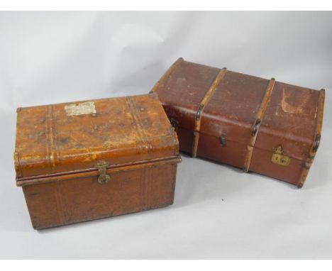 A canvas trunk, 85cm x 53cm x 34cm, and a tin trunk, 60cm x 44cm x 41cm, (2).