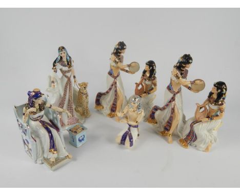 Royal Worcester porcelain Egyptian figures, for Compton & Woodhouse, comprising Nefertari, The Jewels of Cleopatra and a pair