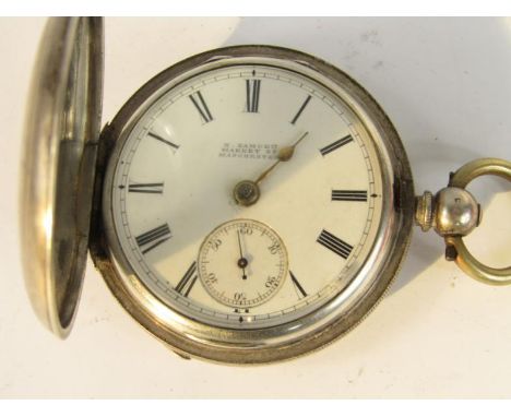A Victorian silver hunting cased gentleman's pocket watch, key wind, enamel dial, bearing Roman numerals, subsidiary seconds 
