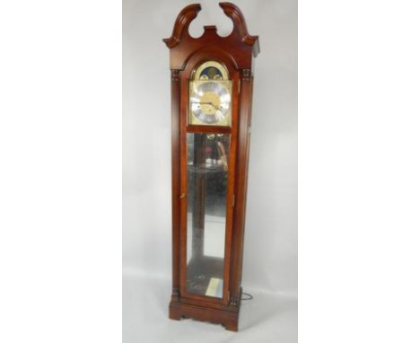 A Sligh mahogany longcase clock, brass break arch dial with moon phase, silvered chapter ring bearing Arabic numerals, eight 