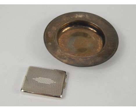A George V silver match sleeve, with engine turned decoration, containing matches, Birmingham 1931, 1.31oz all in, and a Brit