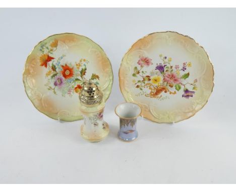 A Carltonware blush ware sugar sifter painted with flowers, pierced brass lid, two moulded plates painted with flowers, and a