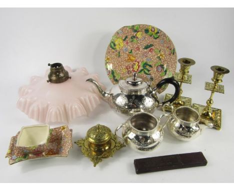 A Cooper Bros plated three piece tea set, brass inkwell and a pair of candlesticks, three items of Royal Winton chintz potter