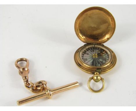 A 15ct gold T-bar and snap clasp, 5.9g, together with a gold plated hunting cased pocket compass.