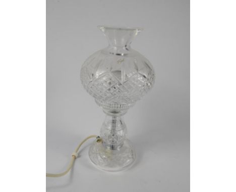 A Waterford cut glass table lamp and shade, 31cm high.
