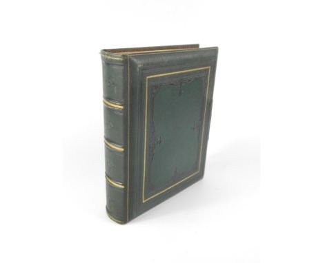 A Victorian gilt tooled  green Morocco portrait photograph album, with a brass clasp, by M W & Co.