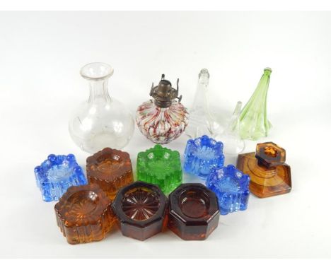 Eight pressed glass furniture rests, German mottled fluted glass oil lamp, three glass epergne trumpets, slag glass candlesti