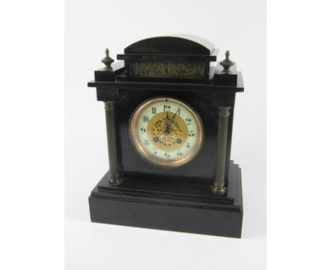 A French late 19thC slate and brass architectural mantel clock, pierced brass dial with enamel chapter ring bearing Arabic nu