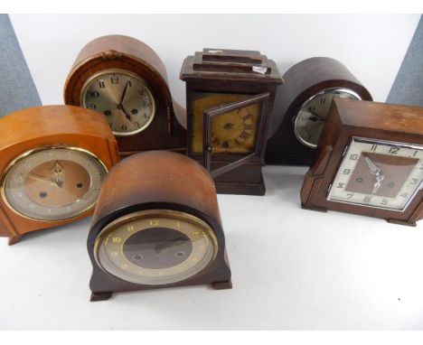 A group of oak cased mantel clocks, including Napoleon hat clocks, late 19thC/early 20thC, (6).