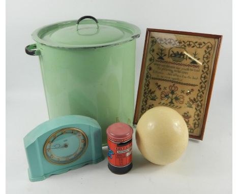 A green enamel flour or potato bin, 23cm high, a 19thC sampler by Fanny Gathercole, 28cm x 19cm, Smiths turquoise Bakelite ma