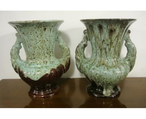 CERAMIC/ VINTAGE - A pair of fat lava style thistle shaped vases, stamped 'Foreign' to base. Each piece measures 22cm tall.
