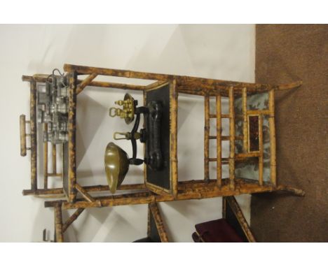 FURNITURE/ HOME - An antique bamboo 'Tiki' style shelf/ display unit with built in magazine rack to base. 