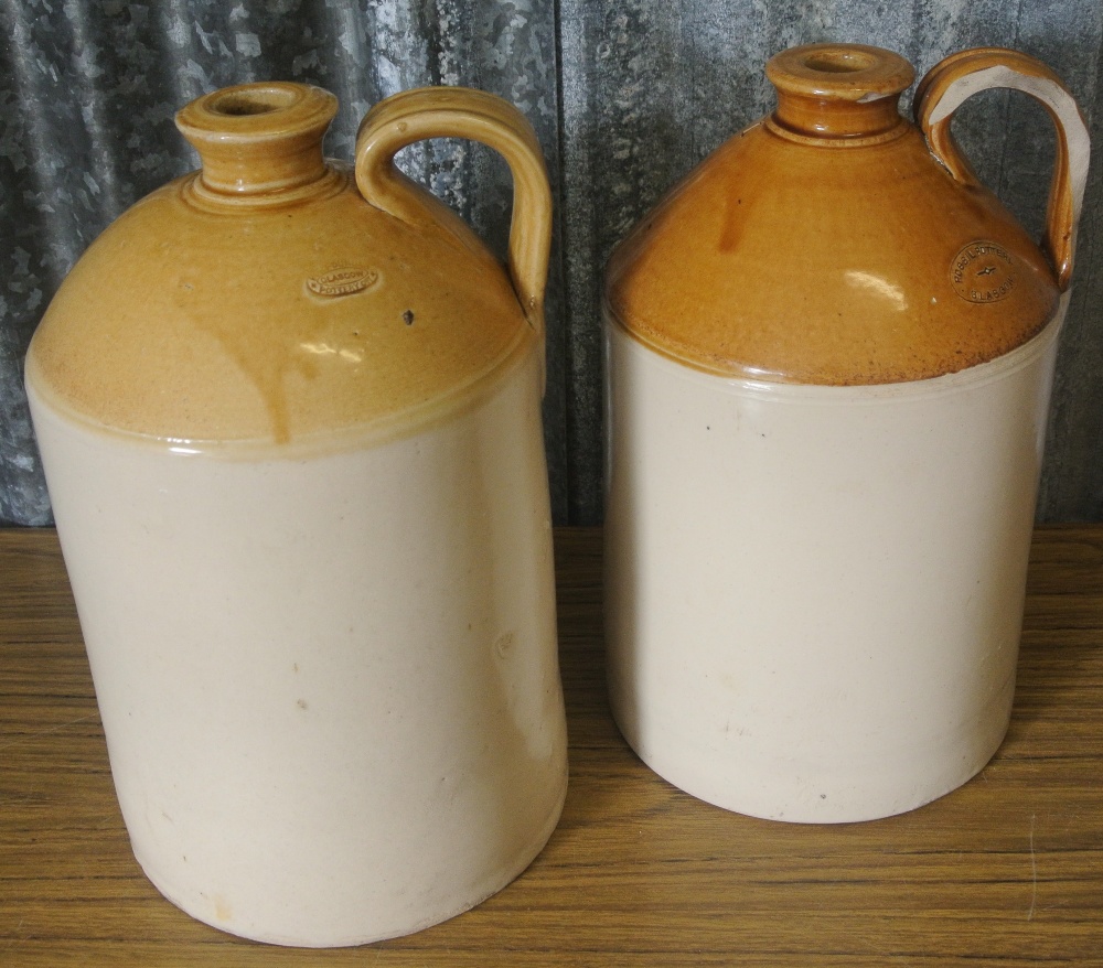 ANTIQUE/ VINTAGE A pair of stoneware bottles by Port Dundas of
