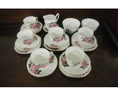 ANTIQUE/ TEACUPS - A matching set of  6 teacups, saucers, side plates, milk jug & 2 sugar bowls with a Rose pattern, lacking 