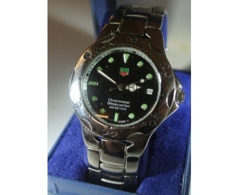 WATCHES - A boxed replica Tag Heuer chronometer fashion watch. Untested.
