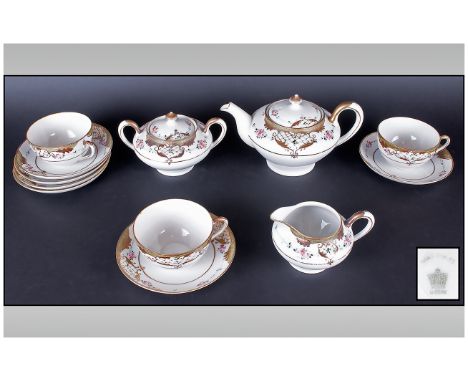 Nippon Part Tea Set comprising 3 trios, tea pot, lidded two handled sugar bowl, milk jug, (12)