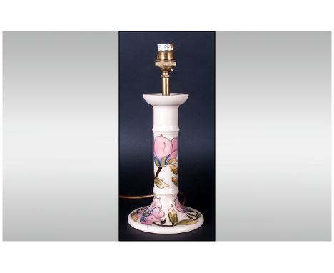 Moorcroft Lamp Base in a candlestick style with pink hibiscus on a cream ground; 8 inches high excluding fittings; impressed 