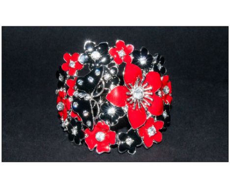 Red and Black Enamel Cuff Bangle, flowers and a butterfly enamelled in either black or red and studded with clear Austrian cr