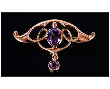 Victorian - Art Nouveau 9ct Gold and Amethyst Set Pendant / Brooch. Marked 9ct. 