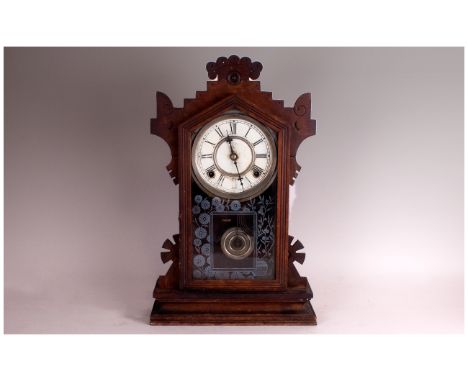 American Shelf Mantle Alarm Clock by the Waterbury Clock Co Waterbury Conn Trade Label attached to the back, with a ginger br