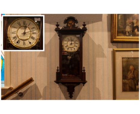 Victorian Walnut Inlaid Cased Wall Clock, makers SKARRAPP, 8 day movement clock. In working order with one finial missing. 44