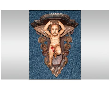 Italian Carved Wood Wall Bracket Depicting A Cherub With Floral Carved Decoration, Looks To Be 19th/Early 20thC, Height 17 In