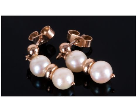 Pair of Ladies 9ct Gold and Pearl Drop Earrings. Marked 9ct. 