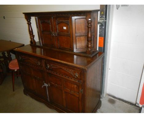 An oak Ercol style sideboard.