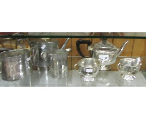 2 silver plate tea sets.