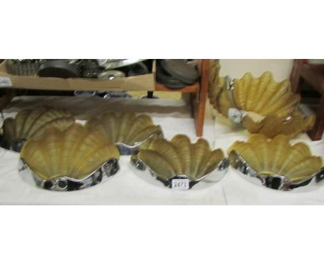 A Deco shell ceiling light with 5 matching wall lights.
