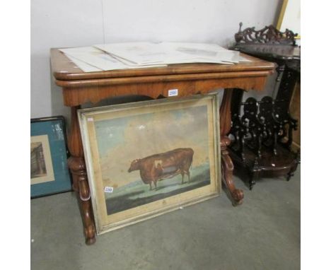 A 19th century fold over card table in figured walnut, a/f.