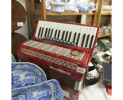 A Royal Standard piano accordion.